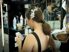 Half-up bridal hairstyle styled inside Fadi Nasr salon