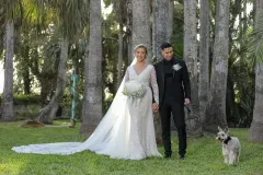 Bride and groom portrait in a palm grove at a Rio Grande Valley wedding by AB Event Productions